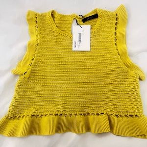 Cropped flutter sleeve sweater.